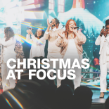 focus church graphic with singers on a stage with a blue background