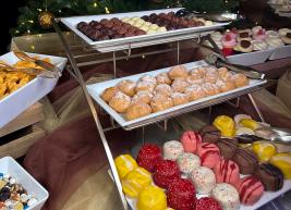 a photo of a display of desserts